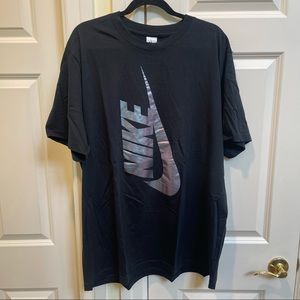 Nike Men’s Black T-Shirt With Silver Halographic Upside Down Logo On Front